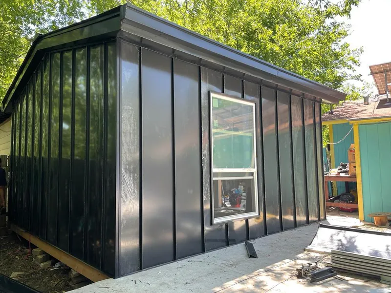 Black standing seam metal wall panels for Roof Inspection in Chalmette