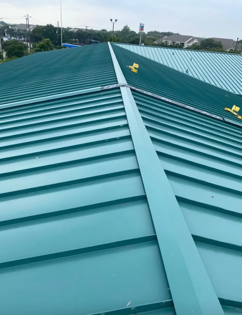 Green commercial metal roof ridge and valley for Metal Roof Repair in Chalmette